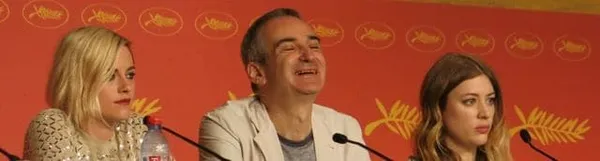 Kristen Stewart, Olivier Assayas and Sigrid Bouaziz in Cannes
